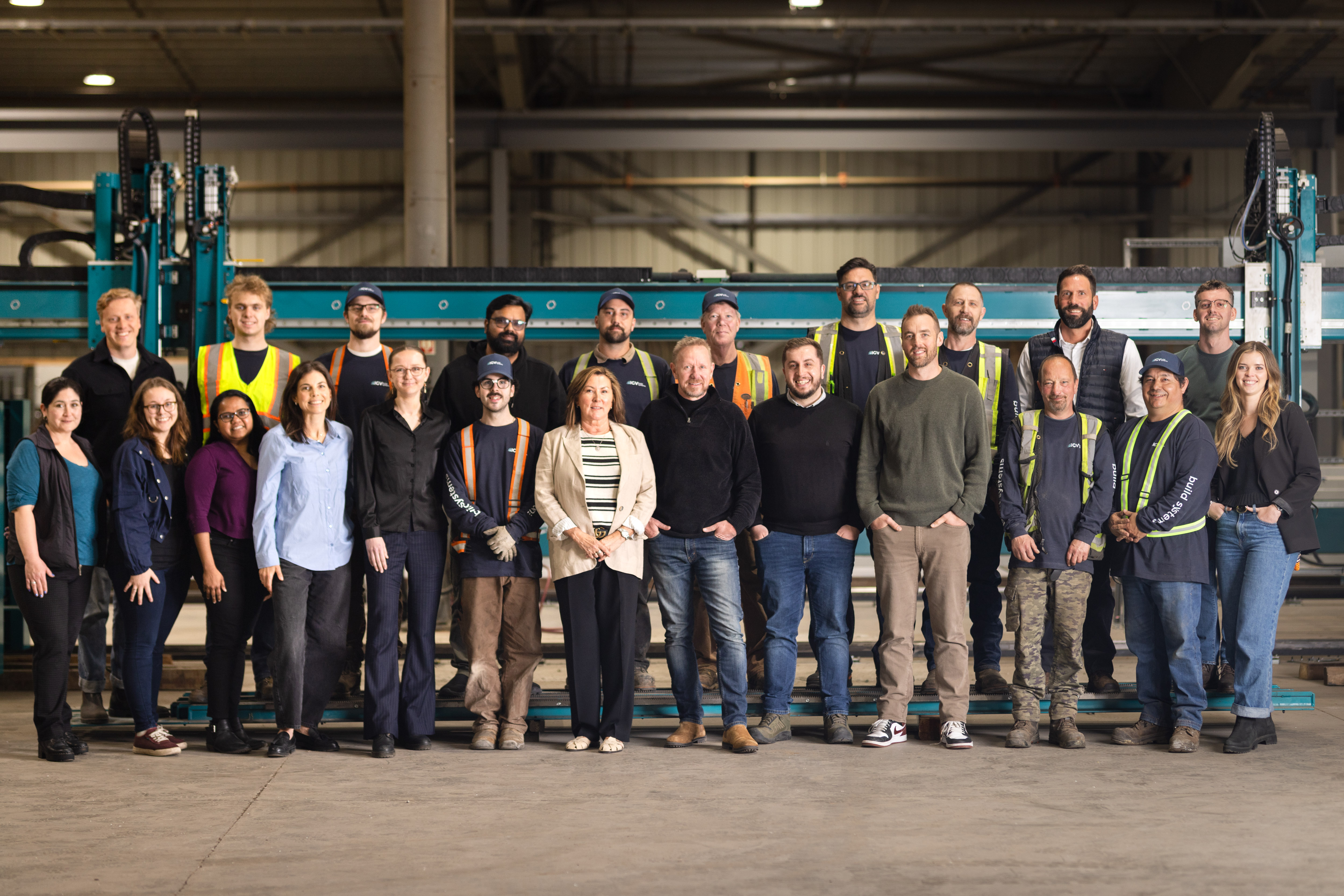 The IGV Housing team gathered at the IGV Build Systems manufacturing facility